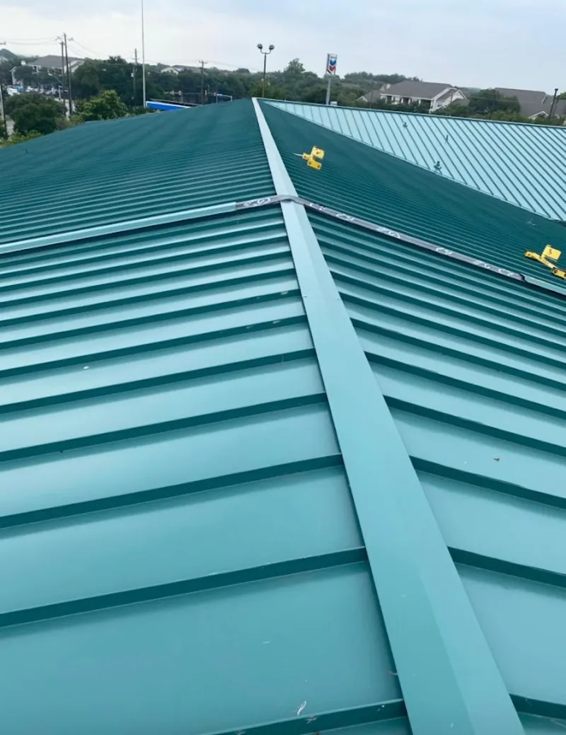 Green commercial metal roof ridge and valley for Metal Roof Repair in Uwchlan