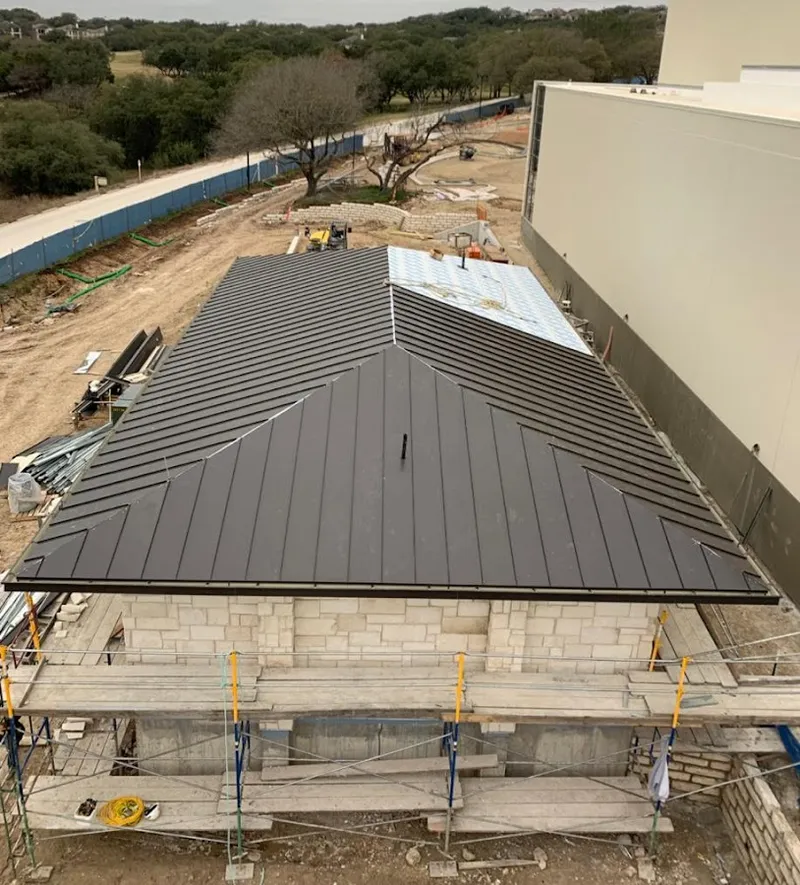 Metal roof new construction with scaffolding in Uwchlan